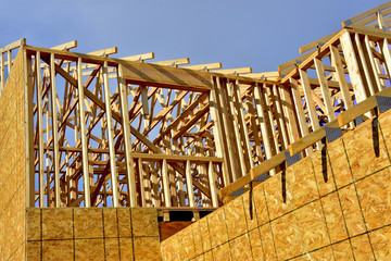 wood frame residential building under construction.
