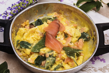 spring meal: scrambled eggs with salmon and sage