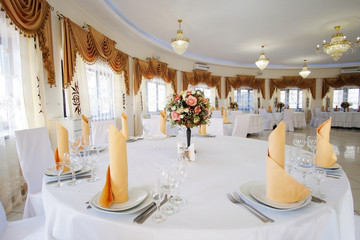 Interior of a cafe with the serviced tables