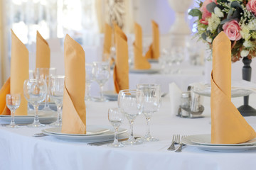 Interior of a cafe with the serviced tables