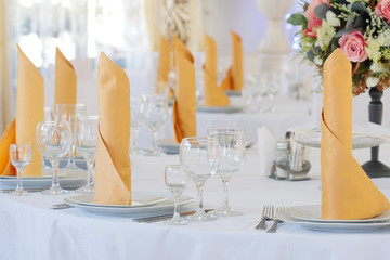 Interior of a cafe with the serviced tables