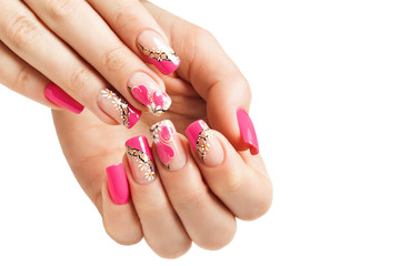 Nail art manicure, with a pattern of flowers and hearts. Isolated.