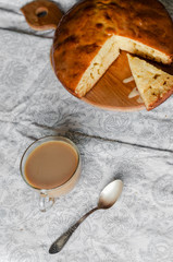 Baking cake to golden crust is poured by condensed milk