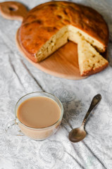 Sweet pie with condensed milk and hot coffee