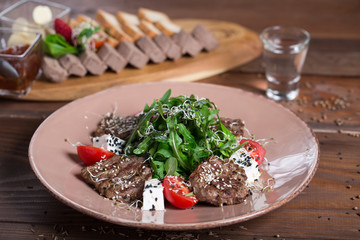 Warm salad with meat