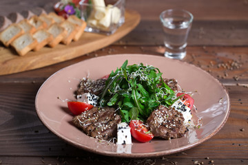 Warm salad with meat