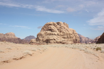 Fototapeta na wymiar Jeep Safari in desert valley Wadi Ramm in Jordan 