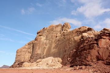 Fototapeta na wymiar Bizarre rock walls consisting of sandstone and granite in desert valley of Wadi Rum in Jordan