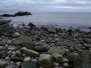 Fototapeta na wymiar Acadia Maine boulders at the waters edge
