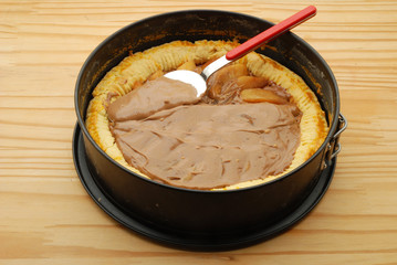 Homemade chocolate cake with pieces of pears