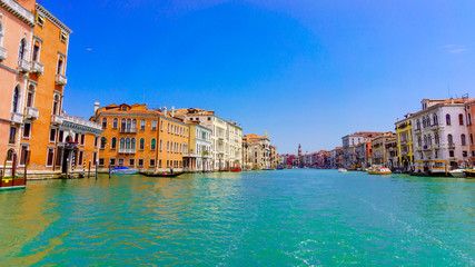 Fototapeta na wymiar VENICE, ITALY - June 01, 2014.View of water street and old buildings in Venice. Canal in Venice, Italy. Architecture and landmarks of Venice