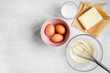 cooking pancake on white background top view ingredients for making