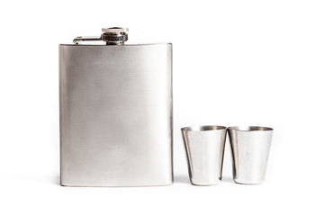 Hip flask and cups  isolated on white