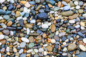 Sea stones background. stones on beach. stone texture.