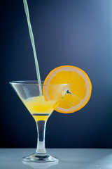 Orange juice and slices of orange fruit