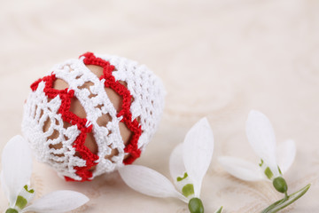 Easter egg with crochet decoration