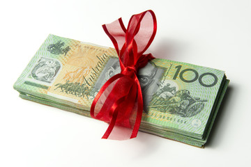 Australia $100 Bundle gift tied red ribbon bow copyspace.
