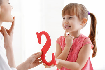 Cute little girl at speech therapist office