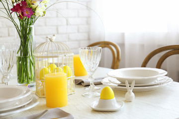 Beautiful Easter table setting in light room
