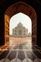 Taj Mahal through a patterned doorway