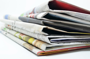 Newspapers folded and stacked