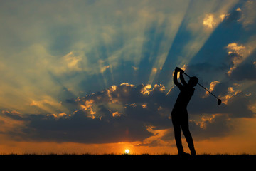 silhouette golfer playing golf during beautiful sunset