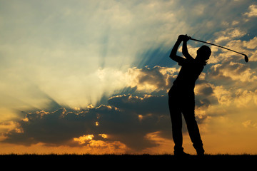 silhouette golfer playing golf during beautiful sunset
