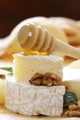 Organic camembert cheese with nuts and pears