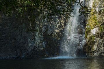 waterfall in tropical deep forest