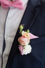 Wedding boutonniere from pretty flowers on Groom`s chest