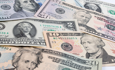 American dollar  or US dollor banknote on table. Close up of assorted American banknote.