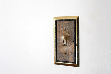 close up on old switch on the wall