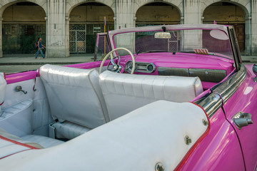 Havana, Cuba -March 14, 2016 -Detail of a bright colored vintage classic American car in Centro...