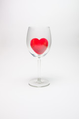 Red velvet fluffy heart in Stemware On a white background
