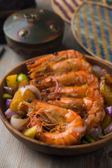 chilli prawns in traditional setting
