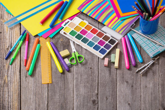 Back to school concept on wooden background