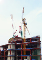 Fototapeta na wymiar Construction. Construction of the company against the gray sky