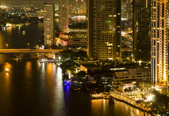 Obraz premium Modern city at night, Thailand