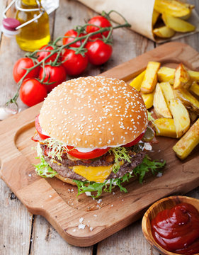 Burger, hamburger with french fries Cutting board.