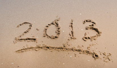 new 2013 year date written in sand