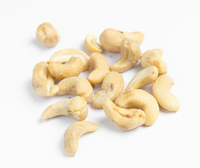 Roasted cashew nuts isolated on white background