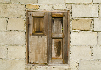 Old brick wall with window