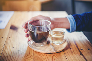 women hands Holding Cup Of Coffee
