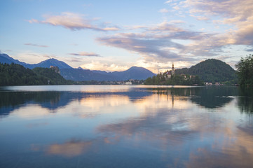 multicolored sunrise over the mountain lake in the Julian Alps, Bled, Slovenia