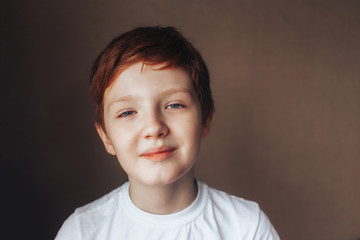 Red-haired boy smiling