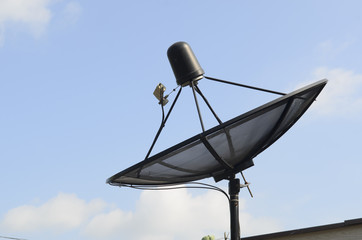 Satellite dish in morning sky