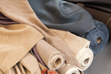Rolls of natural linen cloth