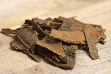 cinnamon on wooden background