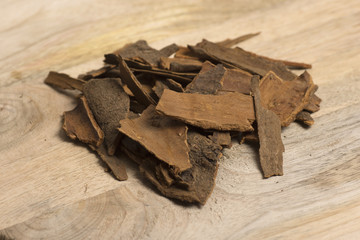 cinnamon on wooden background
