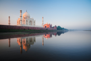 Rear Taj Mahal River Sunrise with Calm Water Reflection - obrazy, fototapety, plakaty